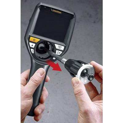 A hand is holding an inspection device with a screen, while the other hand is inserting a cable with a camera into the socket on the device.