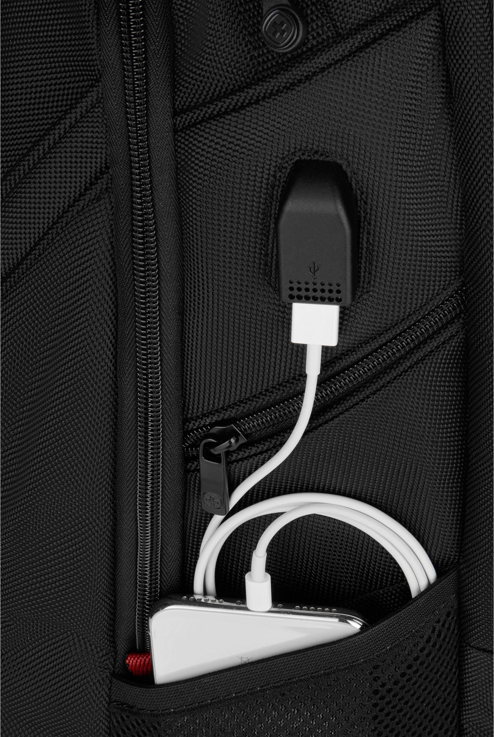 Black rucksack with USB port on the exterior, connected to a white cable that is inserted into a zipped pocket.