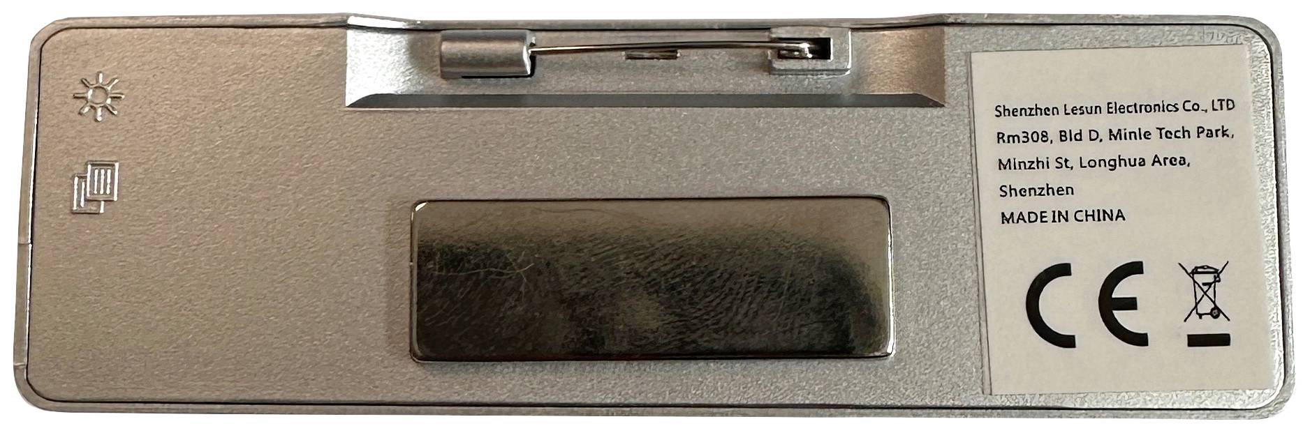 Back of a digital device with a clip, CE and CE logo. Label: 'Shenzhen Leisure Electronics Co. LTD, Manufactured in China'.