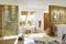 Modern bathroom with shower, two washbasins, mirrors and large window. The walls are partially clad with stone.