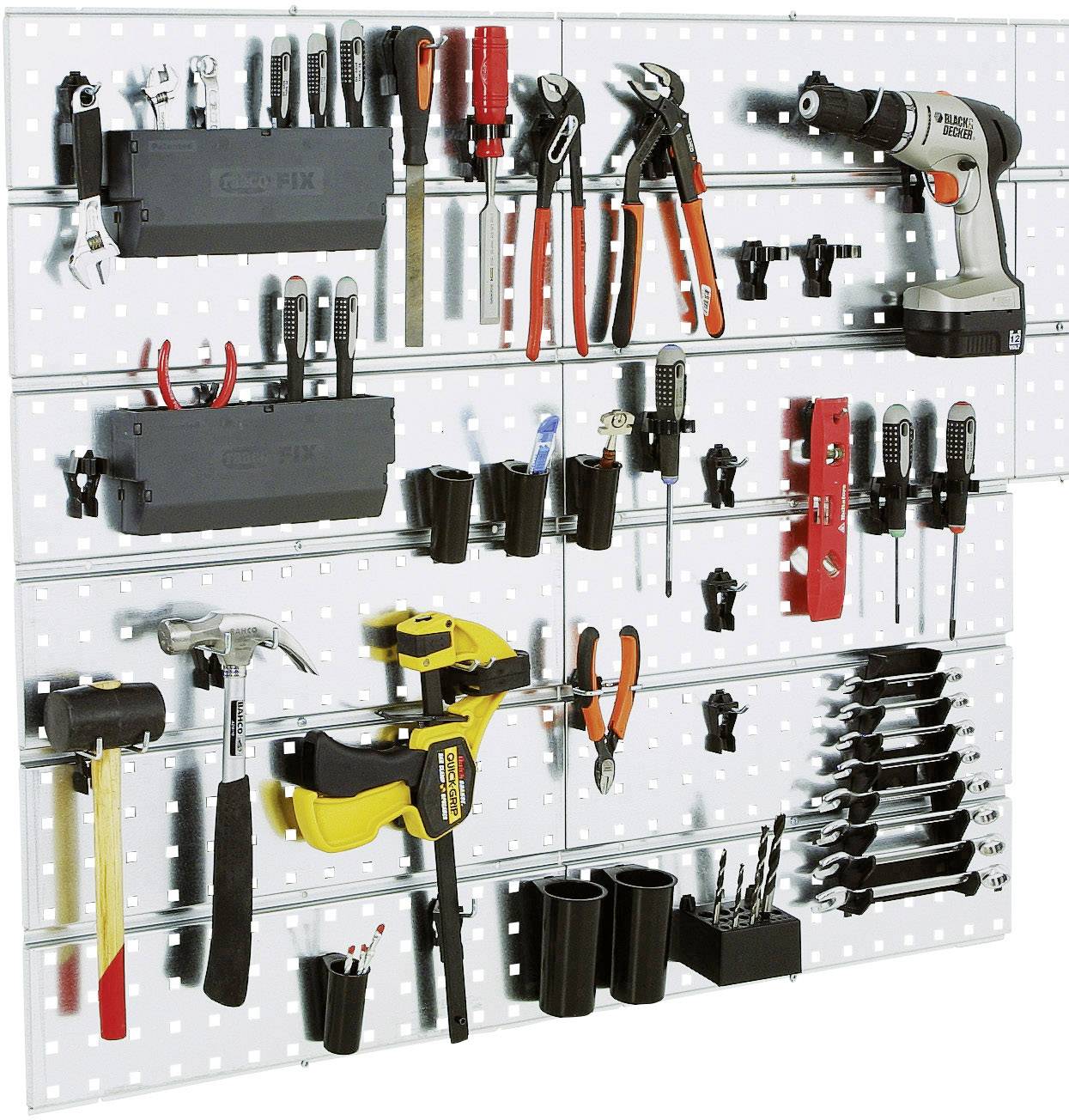 'Tool wall with hammers, screwdrivers, pliers, drill and spanners, neatly arranged in holders.'