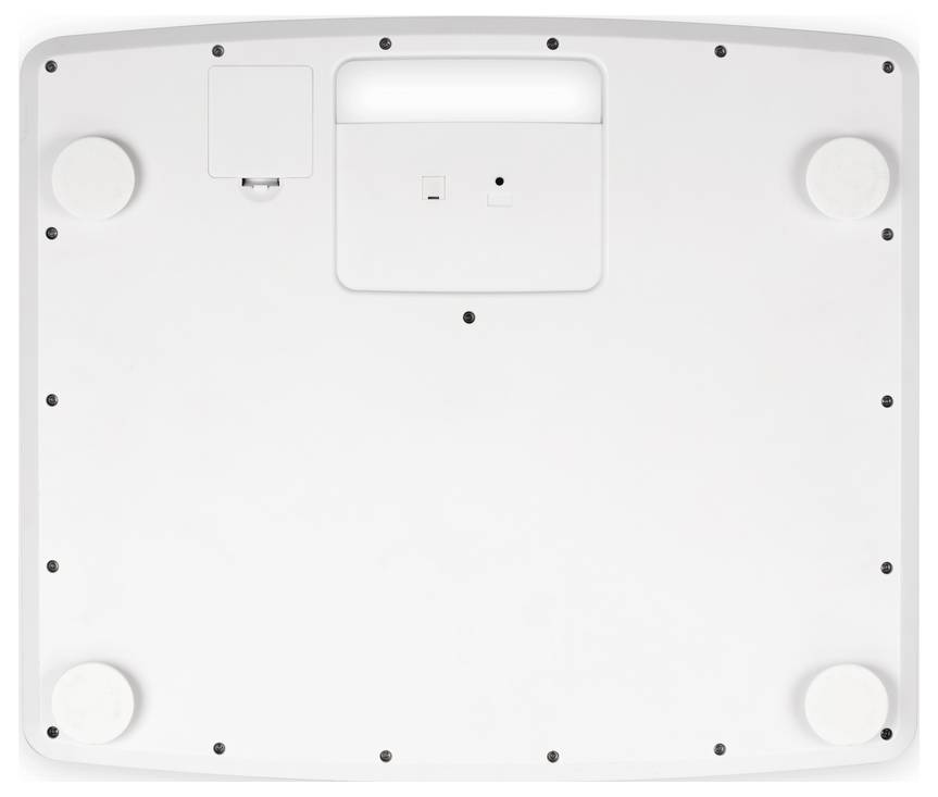 The underside of a white electronic device with four round rubber feet, a battery compartment cover, and several screws.