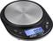 Digital kitchen scales with a metal weighing surface and blue-illuminated display, showing 0.00 grams. Buttons for unit, tare and on/off.
