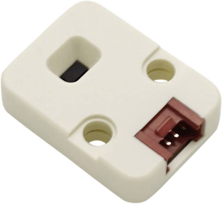 'Close-up of a white electrical switch with a red switch and two mounting holes.'