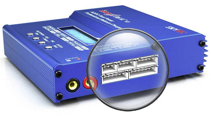 A blue multi-port charger with a display. The magnified view shows four pluggable ports in detail.