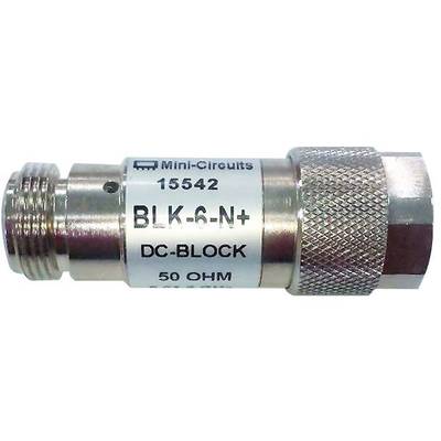 A silver DC block from Mini-Circuits with the model number BLK-6-N+, suitable for 50 ohm applications.