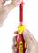 A hand holds a screwdriver with a red, insulated shaft; shows how the shaft is inserted into the yellow and red handle.