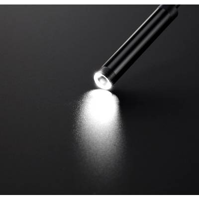 Black torch illuminates a dark surface and creates a white circle of light.