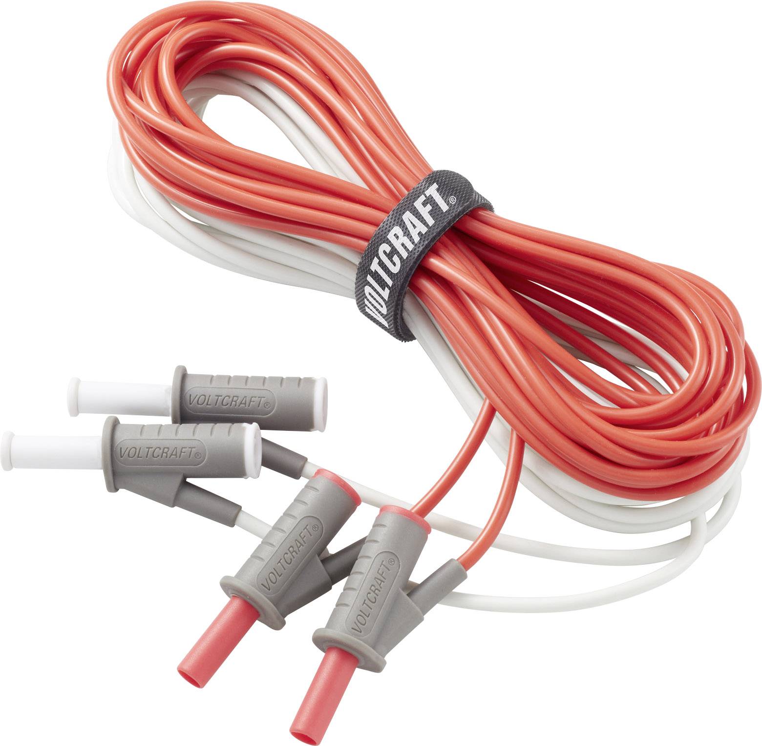 'Voltcraft' measuring leads in red and white with plug connectors, coiled and secured with a hook and loop fastener, for electrical measurements.