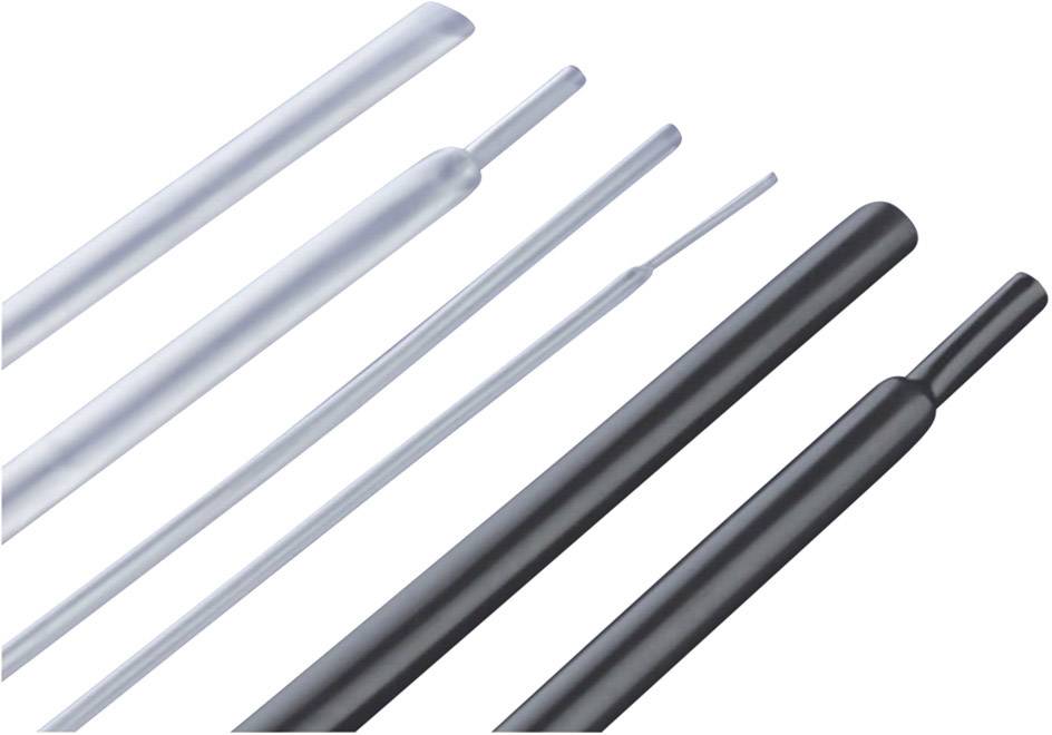 Heat-shrink tubing in various sizes and colours, white and black, lying side by side.