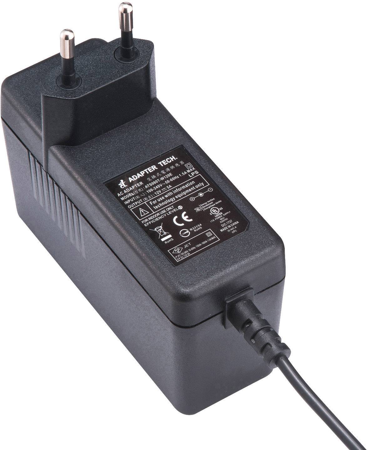'Black power adapter with European plugs, cable connected. Sticker with technical specifications visible on the top surface.'