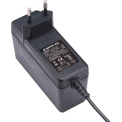 'Black power supply with two round plugs and a cable. A sticker on top displaying technical specifications of the adapter.'