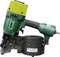 'Pneumatic nailer with green and yellow cover. Drum magazine with yellow nails. Used for construction projects.'