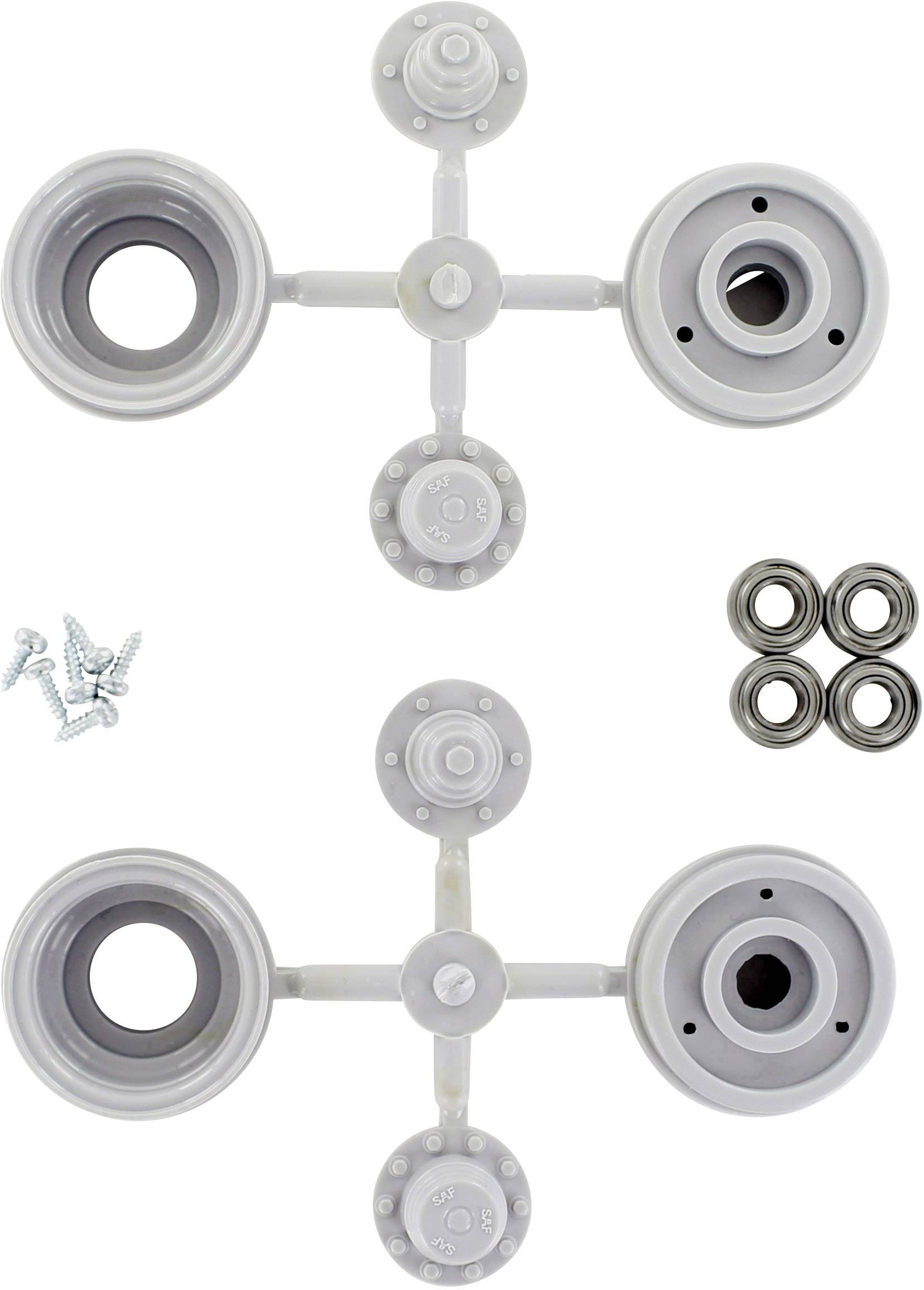 Two circular components with screws and ball bearings, which are potentially part of a mechanical or electronic device.