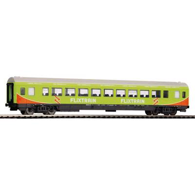 Green train carriage with 'FLIXTRAIN' written on the side, standing on a railway track, with multiple windows.