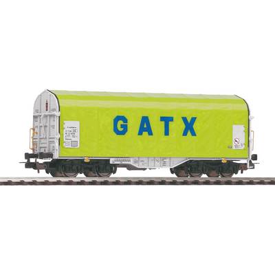'Railway goods wagon with a green protective roof and blue lettering "GATX" on the side.'