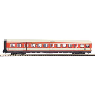 A model train carriage in cream white with red stripes and blue windows. The model is positioned on a section of railway track.