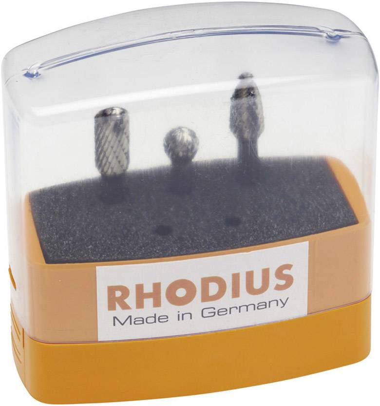 A transparent box with three metallic grinding attachments; marked with 'RHODIUS Made in Germany'.