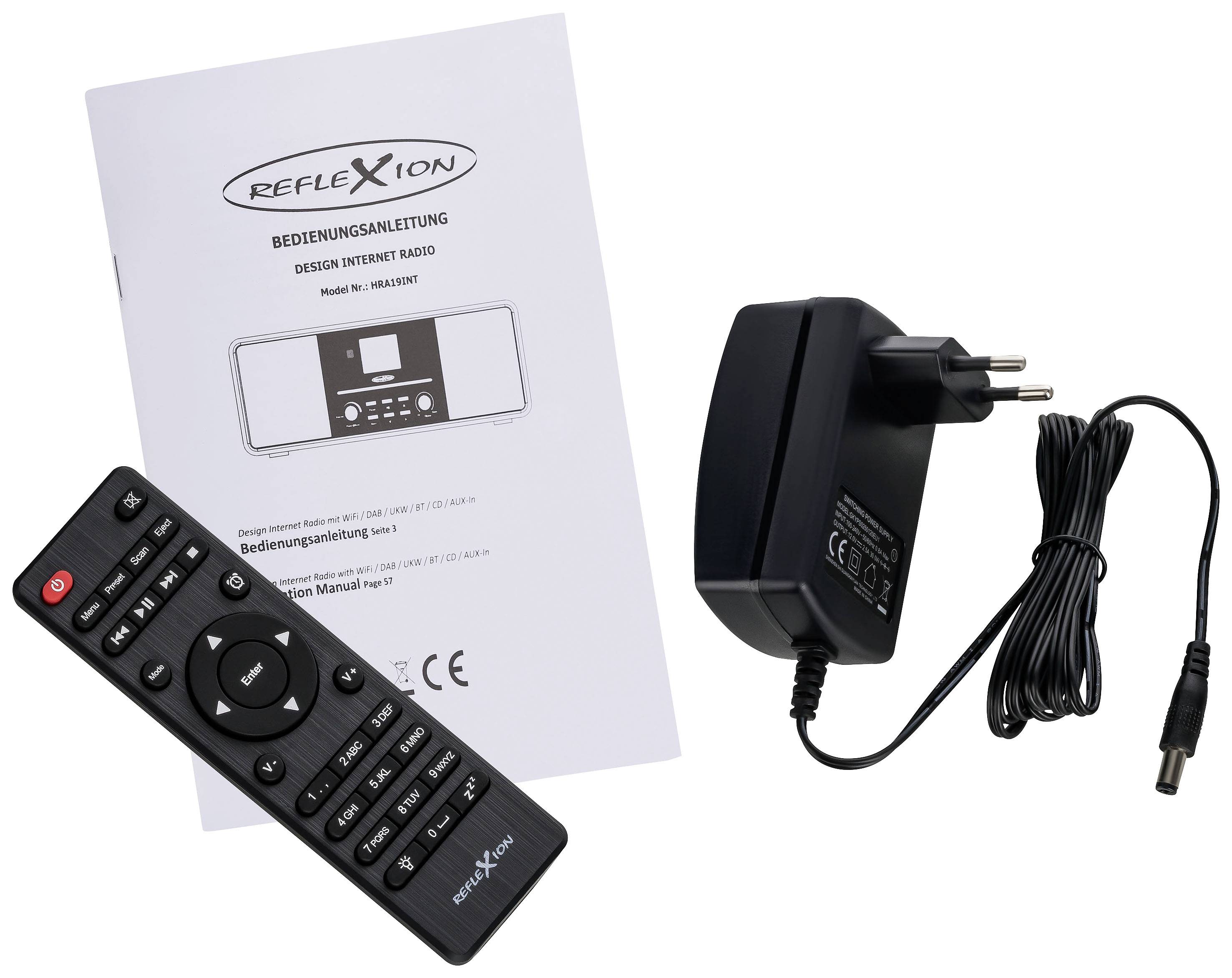 Remote control, user manual and power adapter for a design internet radio by 'Reflexion', model 'HIF 1001 N'.
