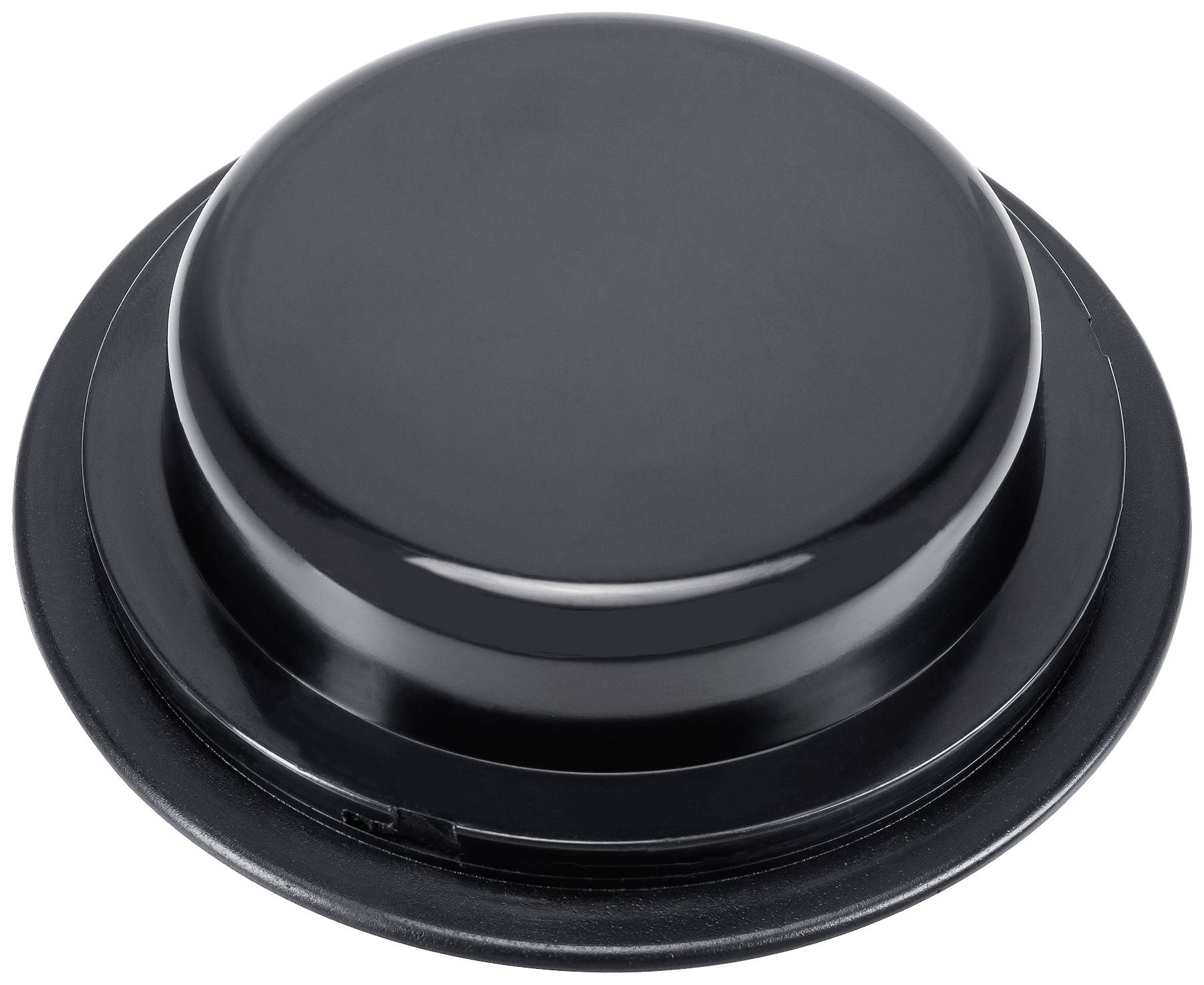 Black, round press button on a white background.