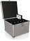 An open aluminium briefcase with multiple interior compartments containing black DVD cases. One case stands upright in the open lid.