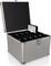 An open silver case with multiple compartments containing CDs. A CD case is pulled out.