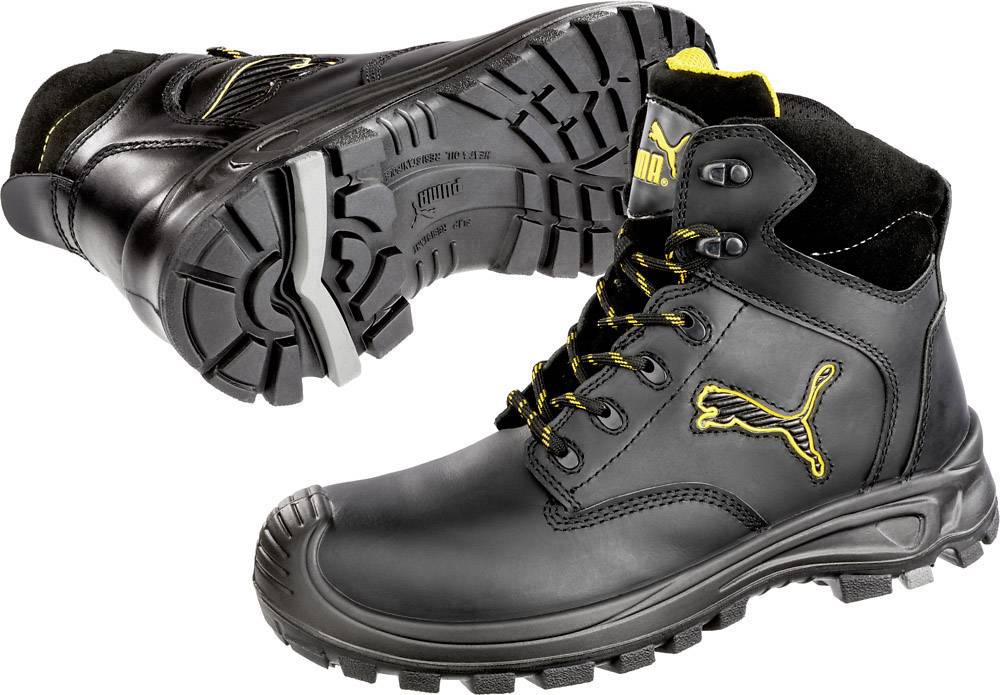 Two black, robust boots with yellow accents and a treaded sole, suitable for outdoor activities or work environments.