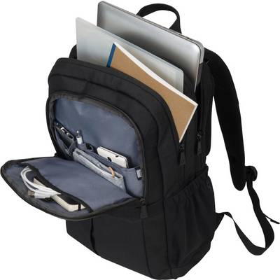 An open rucksack reveals a laptop, a tablet, notebooks and various cables in different compartments. Ideal for office life.