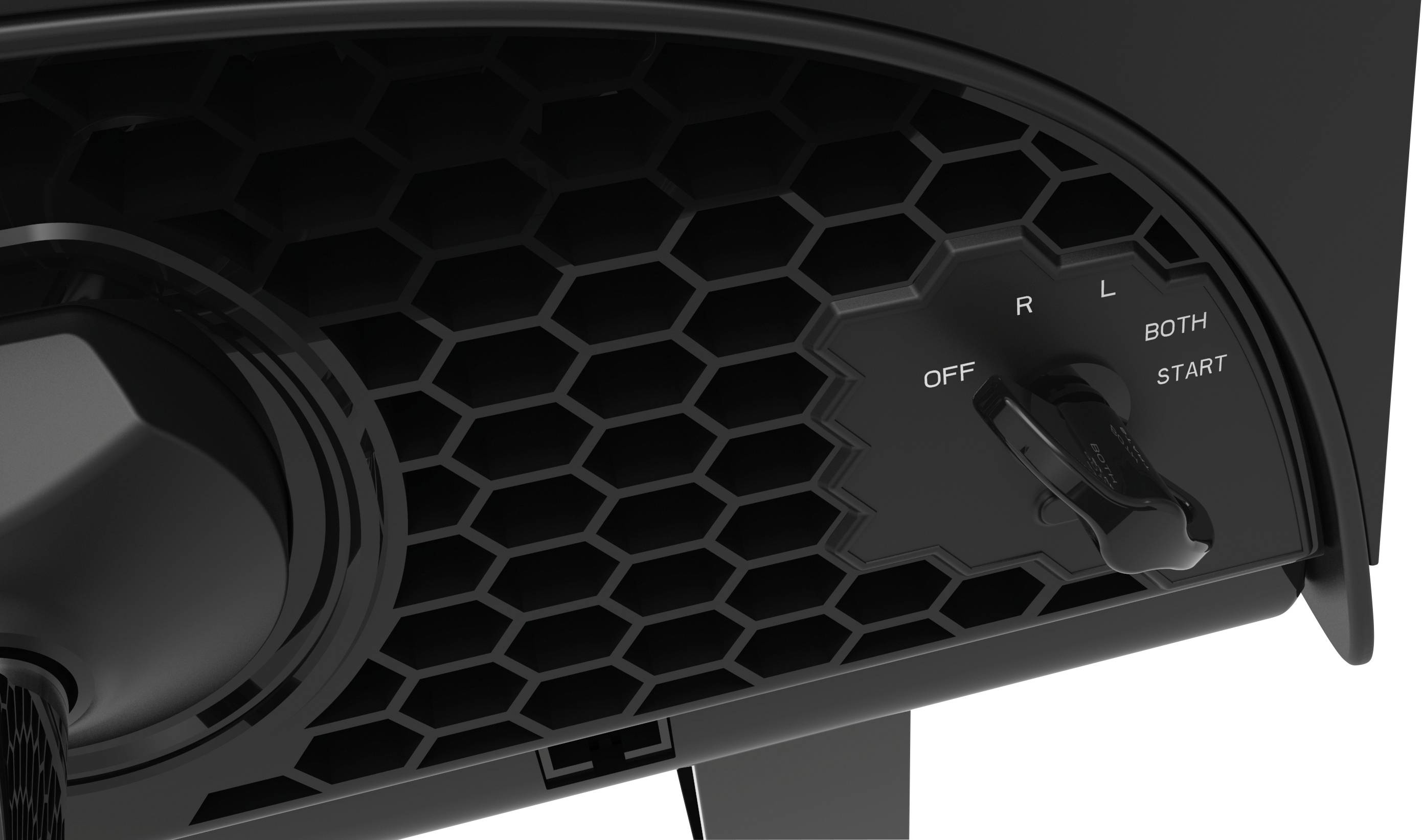 Close-up of a black honeycomb structure with a switch on the right, marked with the positions 'OFF', 'R', 'L', 'BOTH', 'START'.