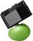 A digital camera mounted on a green, spherical tripod that serves as a flexible base enables versatile camera angles.