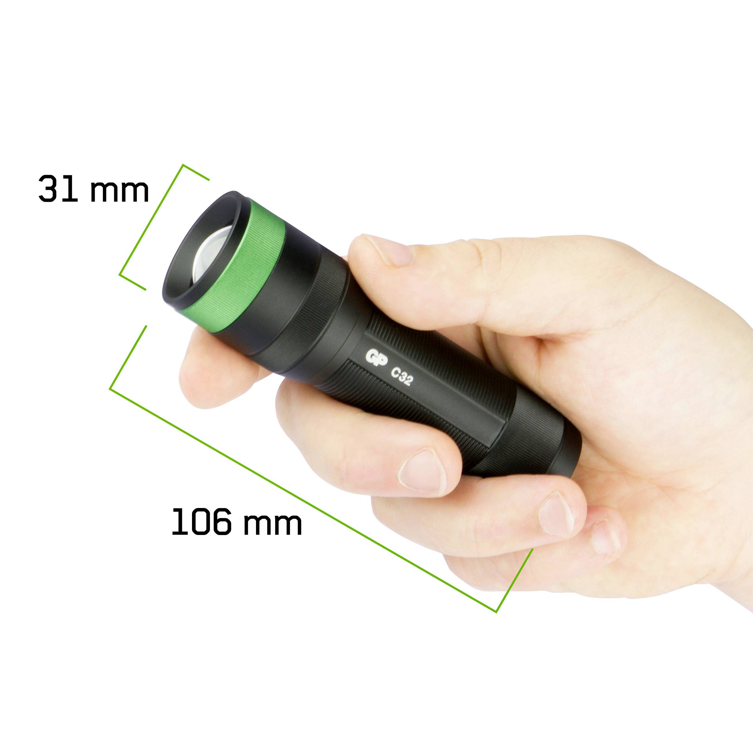 A hand is holding a black torch with green accents. The diameter of the torch head is 31 mm, with a length of 106 mm.<br><br>Note: In British English, "torch" is used instead of the American "flashlight", and measurements are typically spelled out with spaces.