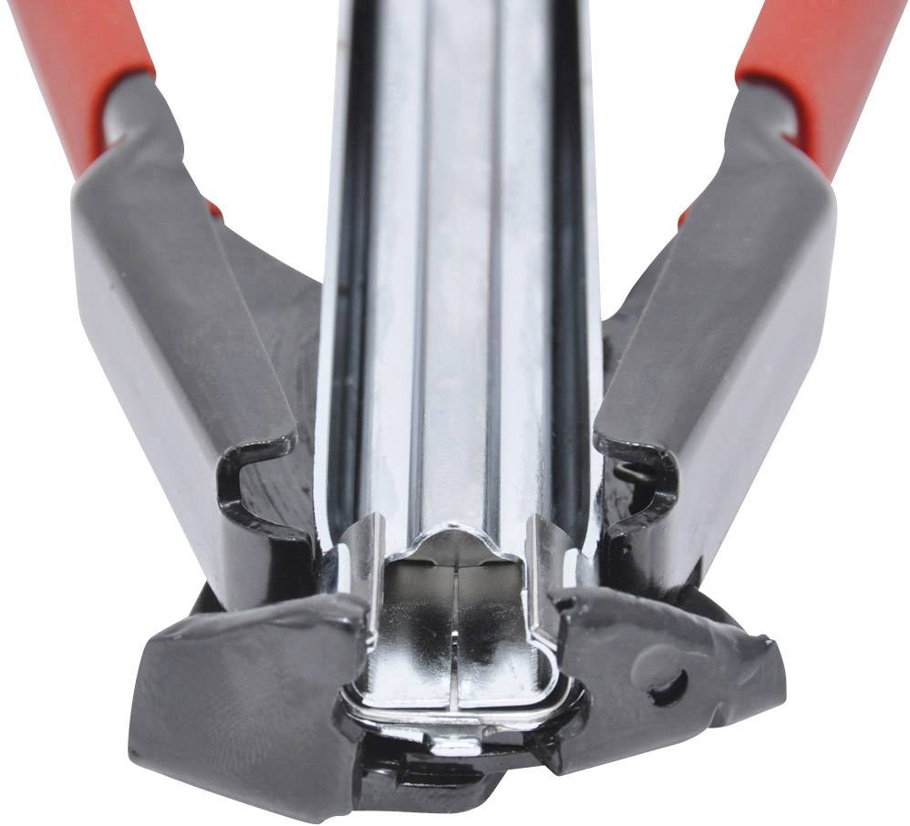 Close-up of an opened, silver stapler with red handles, focusing on its mechanism.