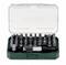 An open set of various screwdriver bits and a handle, arranged in a green case.