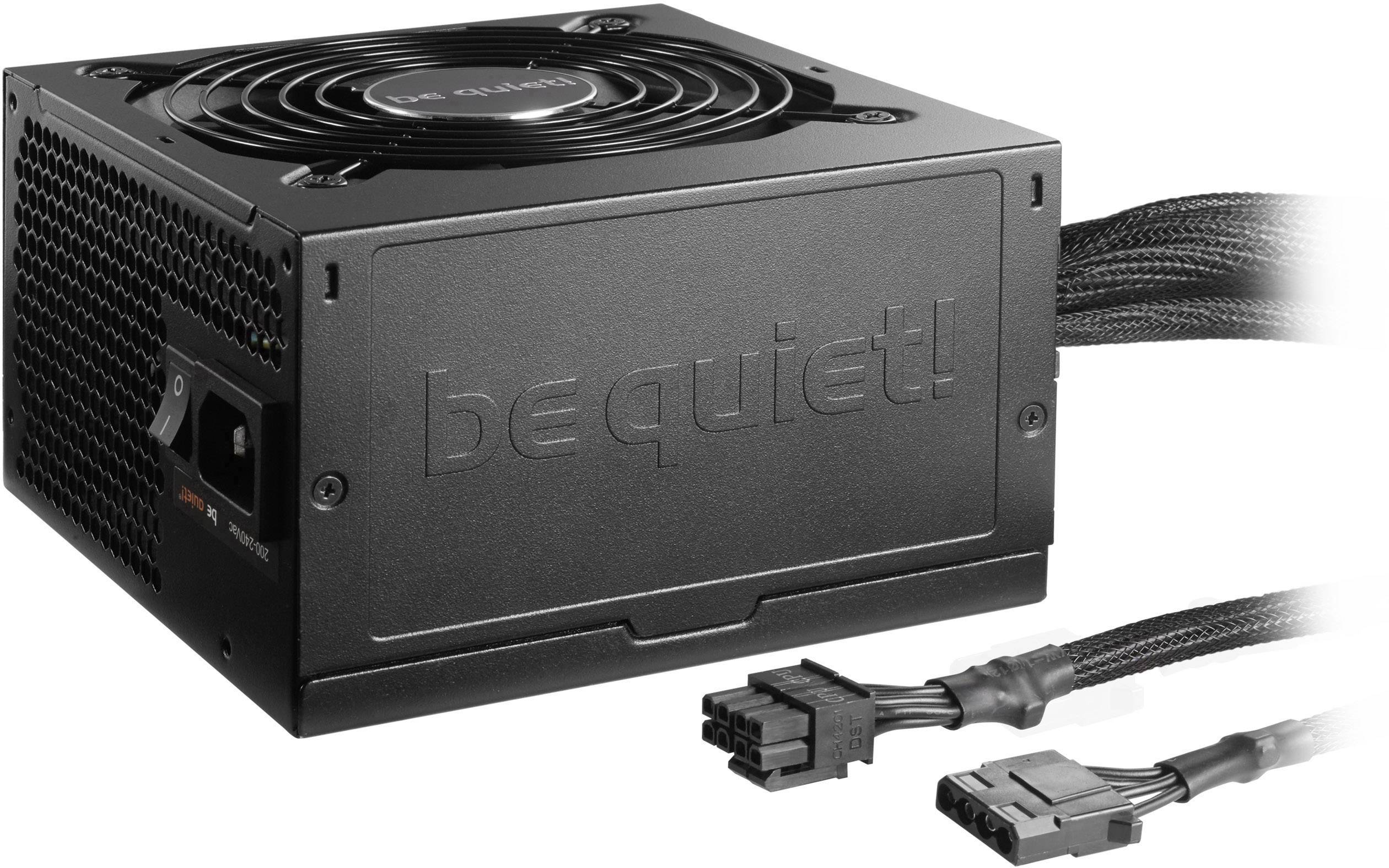 Black computer power supply from 'be quiet!' with a fan and two connected cables used for powering components.
