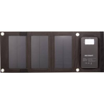Solar charger with three solar panels and a power bank. The product name 'Voltcraft' is displayed on the power bank, alongside CE and other certification logos.