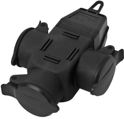 A black, weatherproof distributor with four power sockets, suitable for outdoor use.