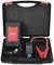 A jump starter set with a portable battery, cables, and a USB charging cable in an open black case.