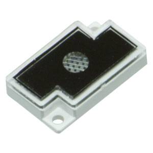 A rectangular, white, electronic component with a black surface and a central, round, grid-like pattern.
