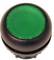 Green button with a black border, typically used for control or activation purposes on machinery.