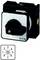 A black rotary switch with white markings; 'Eaton' label. Rotary mechanism for controlling settings.