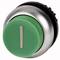 A round, green button with a vertical line in the centre, surrounded by a silver border.