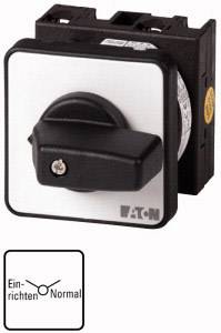 A black rotary switch on a square plate labelled 'Setup' and 'Normal'; brand: Eaton.