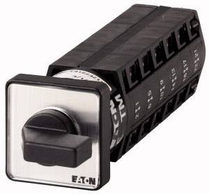 A black toggle switch with a plastic handle, mounted on a rectangular metal panel, surrounded by several electrical connections.
