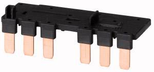 A six-pole copper and plastic electrical connection comb, vertically aligned, for use in an electrical control cabinet.