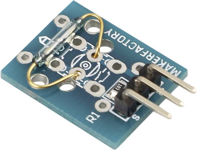 A blue electrical module with multiple connection points and a soldered component, possibly a resistor.