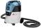 Industrial vacuum cleaner in blue and white with two large wheels and a flexible hose, suitable for workshop or construction site.