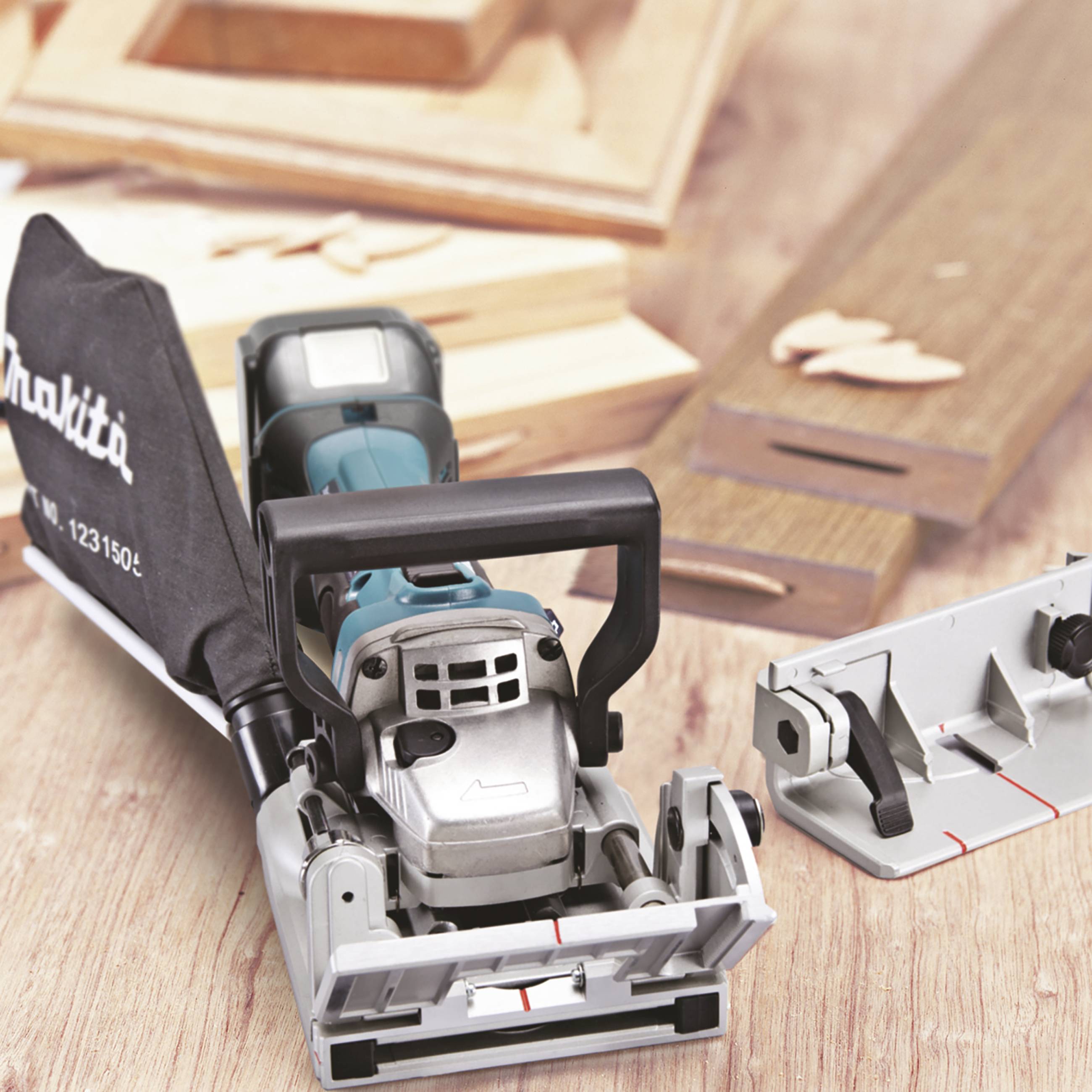 An electric wood router on a workbench, surrounded by wooden boards and tools, demonstrates applications in carpentry.