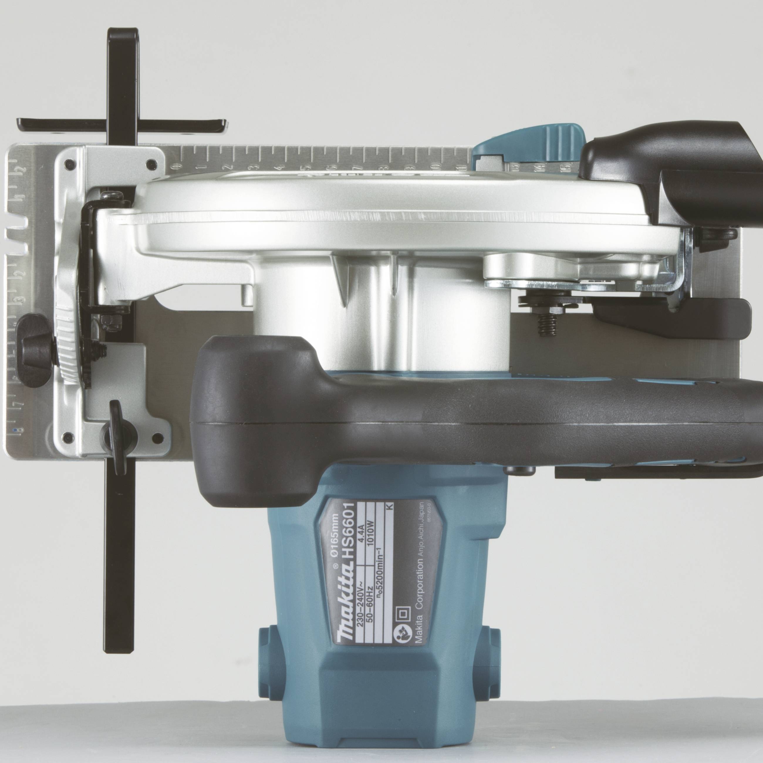 A cordless circular saw viewed from the side. It has a blue casing and a silver blade with a black handle.