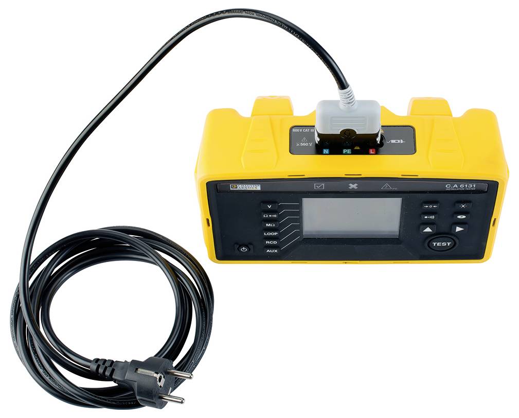 A yellow electronic testing device with a display and connected cable shows connections and testing functions.