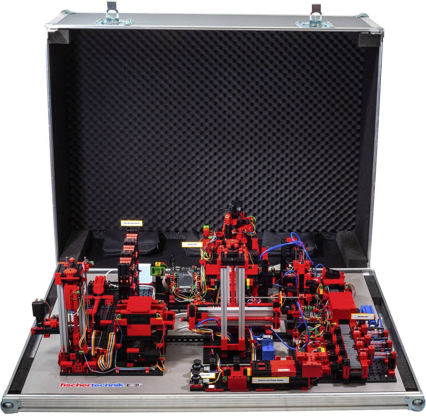 An intricately designed technical case with a complex arrangement of red and black components and wires, potentially a learning or demonstration model for mechanical engineering.